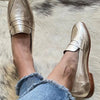 GLÄNZENDE MOCCASINS IN HELLGOLD