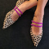 LEOPARDEN-DECOLLETÉ MIT DOPPELTEM RIEGEL