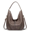 Minervas klassische Vielseitigkeit | Vintage Tasche